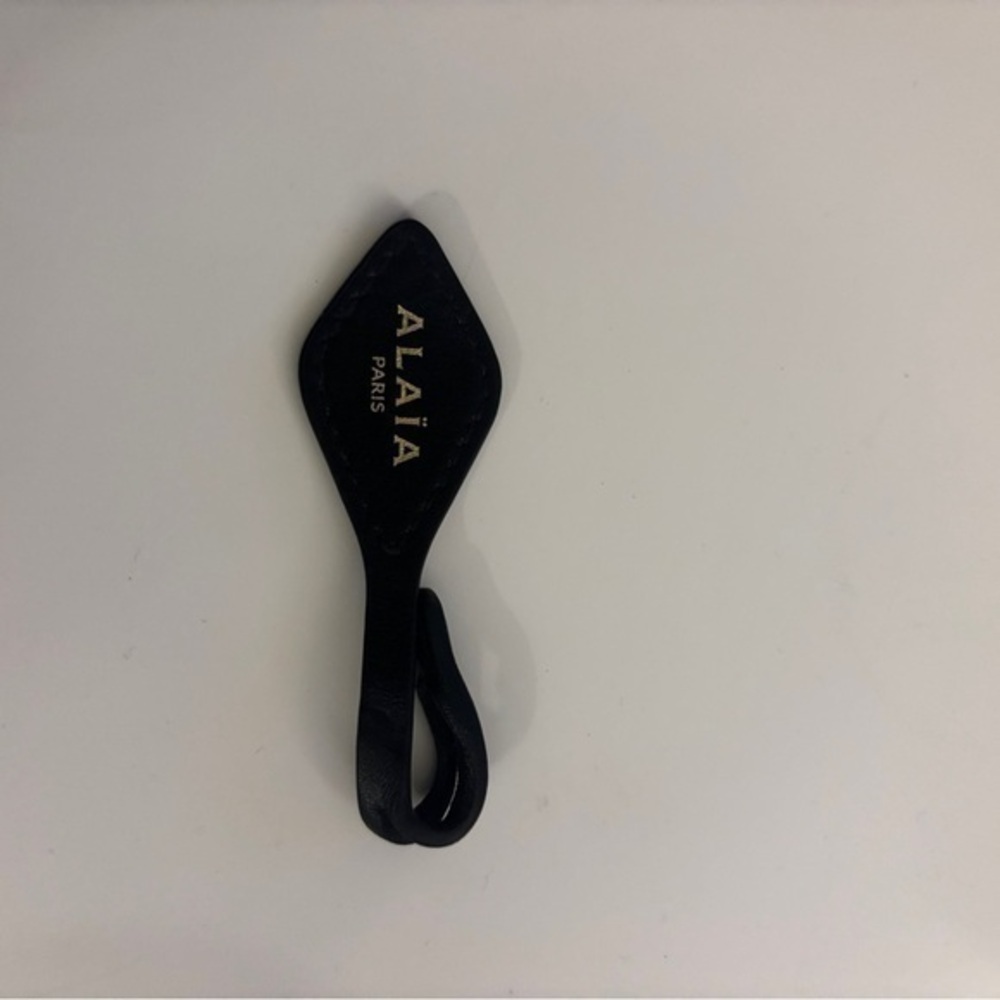Alaia Black Leather Bag Tag